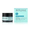 Repechage Hydra Dew Pure Elixir Balm -kasvovoide 50 ml kuiville, vahingoittuneille ihoille. Tuotepakkaus ja purkki sinisävyisessä väriteemassa.